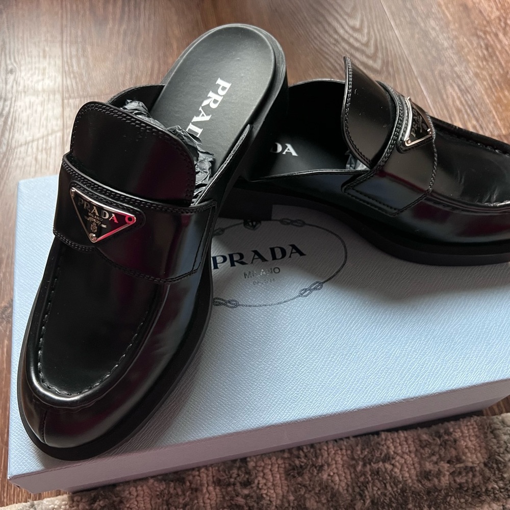 One pair of Prada loafers. Worn only ones. Pristine condition.